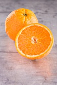 Whole orange and half an orange