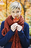 Young woman with leaf