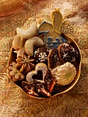 Assorted Christmas biscuits in golden bowl