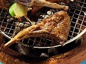 Lamb chops on the barbecue with lime