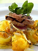 Tuna with watercress on potato salad