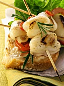 Barbecued cuttlefish with cherry tomatoes on white bread