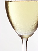 White wine glass with drops of water (detail)