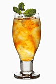 Cold peppermint tea with fresh mint in glass