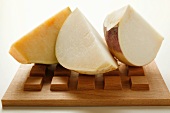 Three chunks of turnip on wooden board