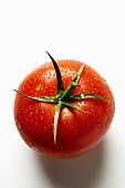 Tomato with drops of water (from above)