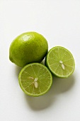 Two Key limes, one halved