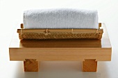 Japanese washcloth on wooden bench