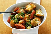 Bread salad with pesto and tomatoes