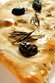 Focaccia with olives and rosemary (close-up)