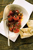 Marinated fried cherry tomatoes; white bread