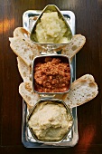 Three spicy dips with white bread