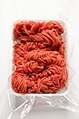 Fresh minced beef in plastic container