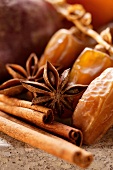 Still life with dates, star anise and cinnamon sticks