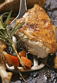 Crispy roast chicken breast on baking tray