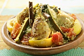 Couscous with chicken, courgettes, tomatoes, lemons & cinnamon