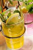 Lemonade with ice cubes and fresh mint
