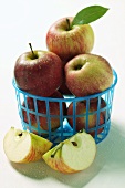 Fresh apples in plastic basket