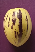 Pepino melon on purple background