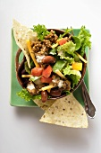 Mexican salad with mince, vegetables and cheese