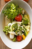 Minestrone with noodles, pesto and fresh herbs