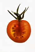 Half a tomato, backlit
