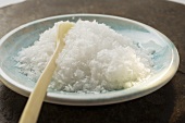 Coarse salt in small bowl with spoon