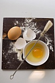 Whole egg, egg yolk, eggshells, flour and pastry brush