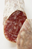 Italian salami with a piece cut off