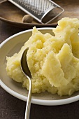 Mashed potato with nutmeg on plate