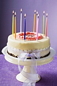 Birthday cake with burning candles