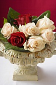 Roses in romantic stone bowl
