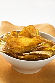 Potato crisps in bowl