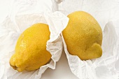 Two lemons in wrapping paper