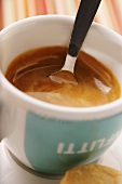 Cup of espresso with spoon