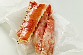 King crab legs on wrapping paper