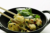 Spicy squid with Thai basil, cooked in the wok