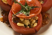 Tomatoes stuffed with bread, pine nuts and raisins