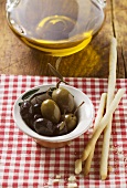 Olives, grissini and olive oil