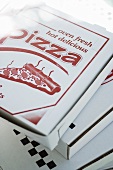 Pizzas in pizza boxes