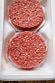 Raw burgers for hamburgers in packaging