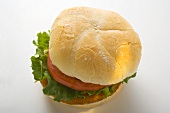 Chicken burger with tomato and lettuce