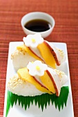 Nigiri sushi with chicken and mango