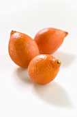 Three small oranges