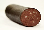 Black pudding, with a piece cut off