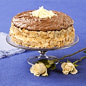 Chocolate almond cake on cake stand