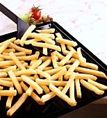 Chips on a baking tray