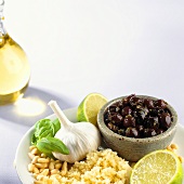 Couscous, pine nuts, garlic and black olives