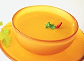 Creamed pumpkin soup in a glass bowl