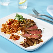 Barbecued rump steak with bulgur and tomato salad